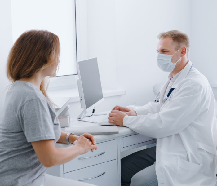 doctor protective mask receives patient his office prevention diseases pandemic